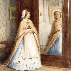 A young girl looking in the mirror